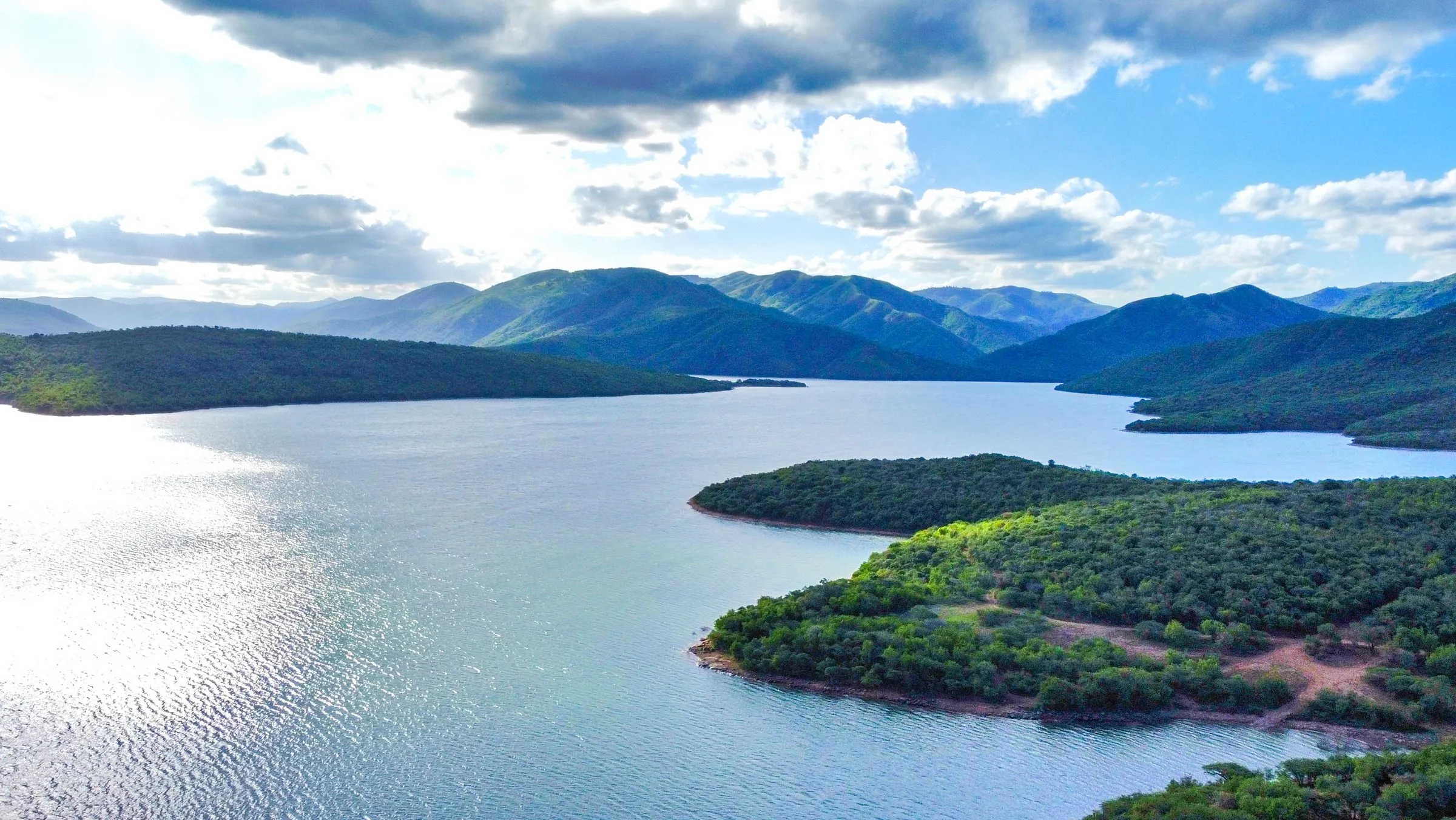 Aerial view of Phobane Dam on a bright day