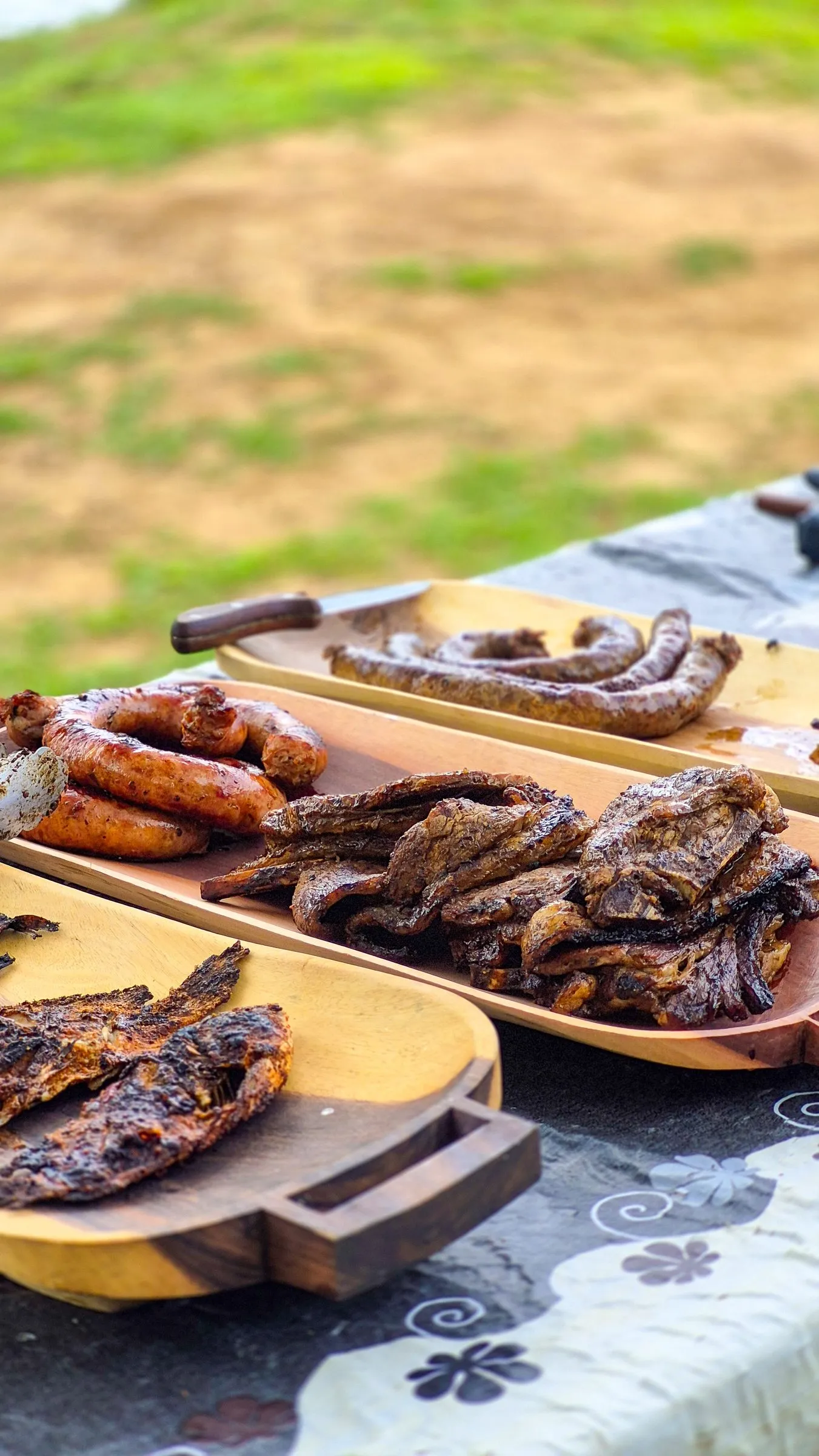 Close-up of a braai platter with wors and chops